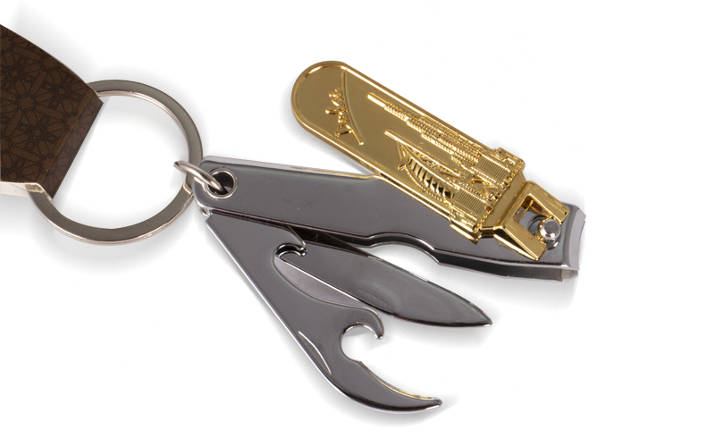 Al Jaber Gold-Plated Nail Clipper Keychain – Burj Khalifa & Burj Al Arab Design