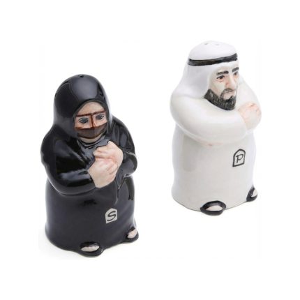 Ceramic salt and pepper shakers shaped like a traditional Arab couple; the male shaker is in a white Kandura and the female shaker is in a black Abaya.
