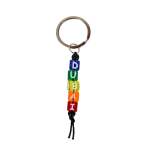 Colorful handmade Dubai letter bead keychain with metal ring and multicolor beads spelling DUBAI