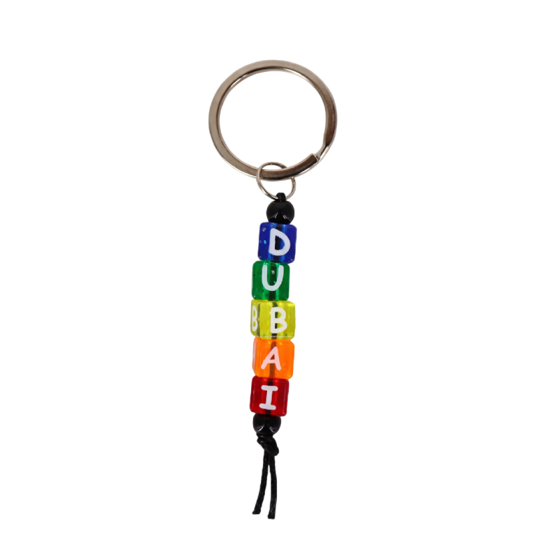 Colorful handmade Dubai letter bead keychain with metal ring and multicolor beads spelling DUBAI